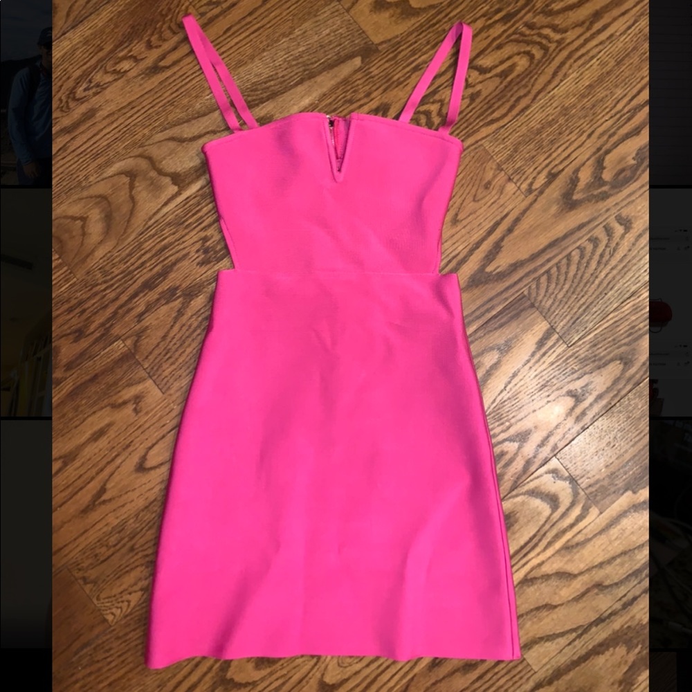 Tight pink dress with open back and v neckline